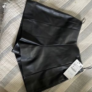 Black faux leather shorts